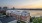 Ariel photo of Boston East Apartments in Boston MA overlooking Boston Harbor at sunset