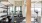 fitness center with floor-to-ceiling windows providing ample lighting