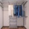 Brithgly lit closet with built-in shelving at Boston East 