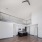 Open-loft style living space with ample lighting in Boston, MA